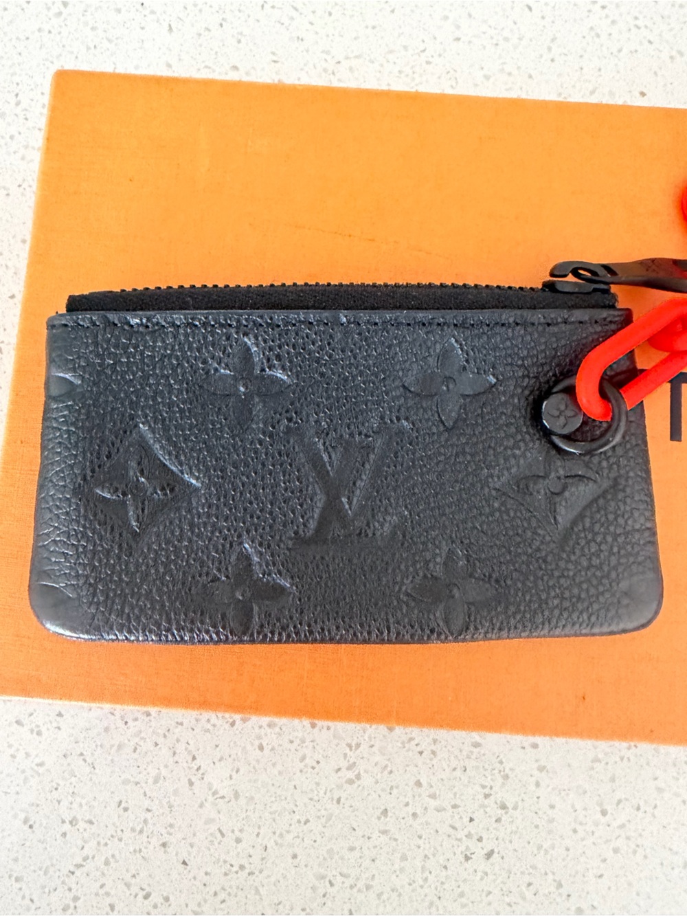 Louis Vuitton Pochette Cles
Monogram Orange Black